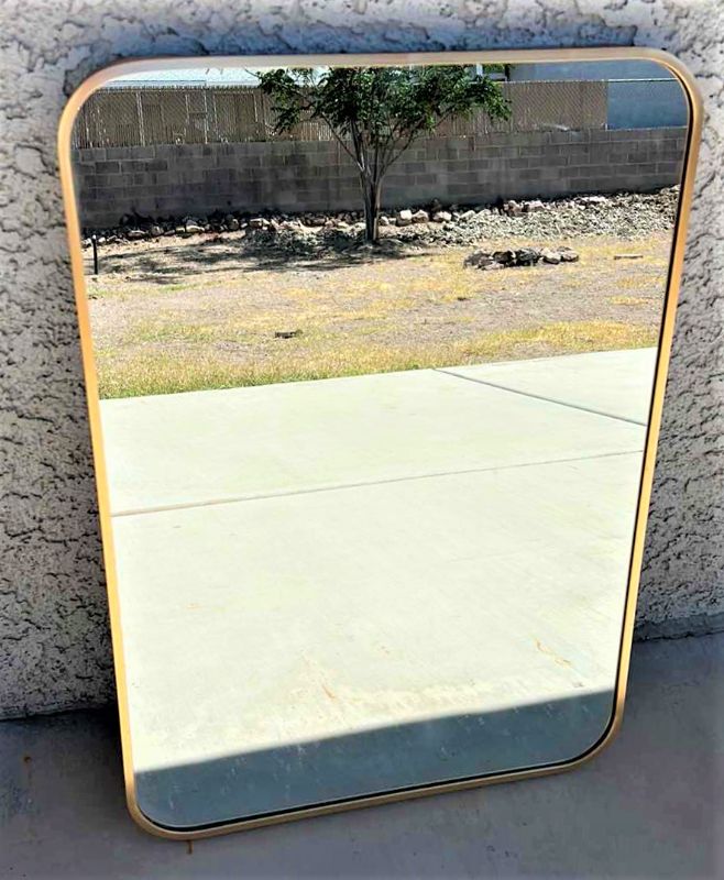 Photo 1 of HOME DECOR - GOLD FRAMED HEAVY METAL MIRROR 20” x 28”