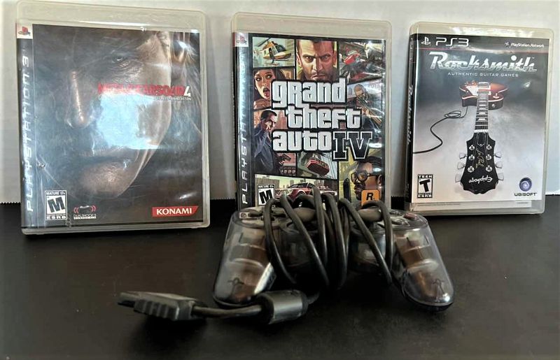 Photo 1 of 3 PS3 GAMES AND 1 CONTROLLER