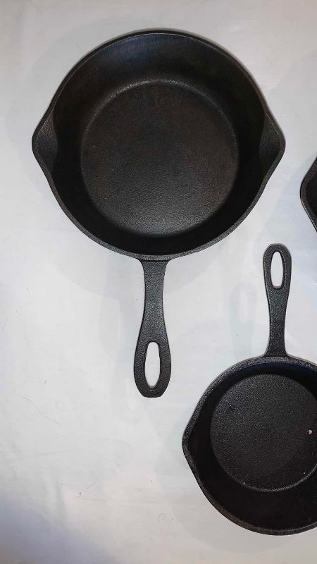 Photo 2 of SET OF 3 CAST IRON SKILLETS WIDEST 10 IN