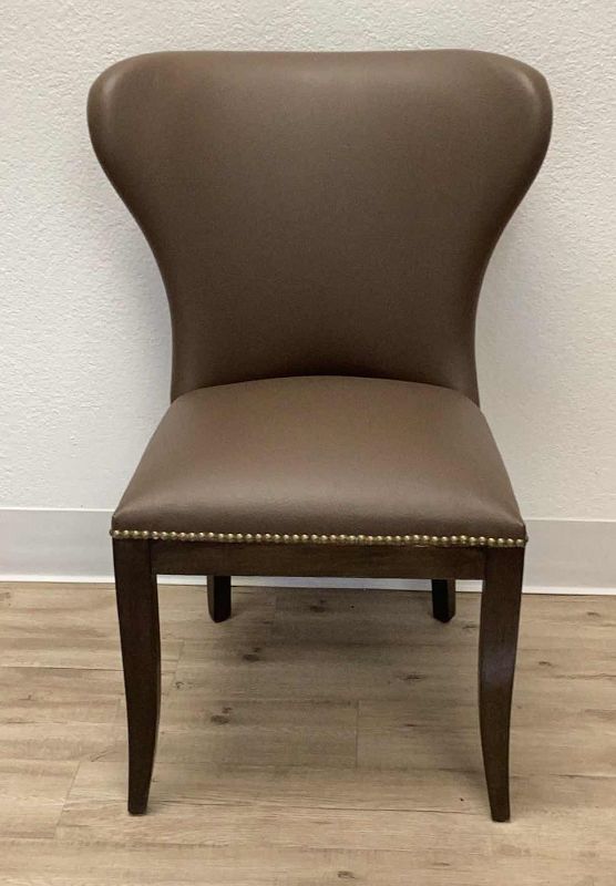 Photo 1 of BROWN LEATHER WING BACK DINING CHAIR WITH NAIL HEAD TRIM