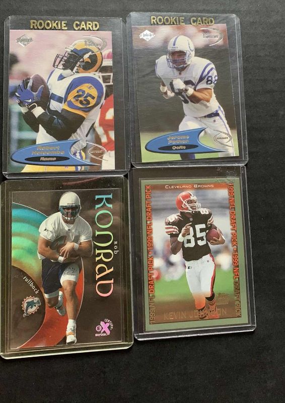 Photo 1 of NFL FOOTBALL 1998 1999 ROOKIES: KEVIN JOHNSON, JEROME PATHON, ROBERT HOLCOLMBE, AND ROB KONRAD