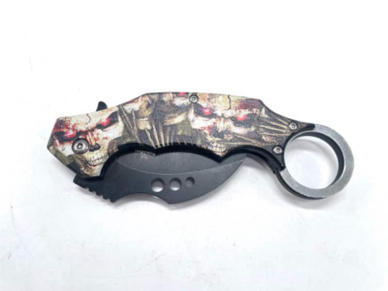 Photo 1 of Karambit Automatic Knife Side Opening Skulls with Red Eyes Pocket Knife with Clip New