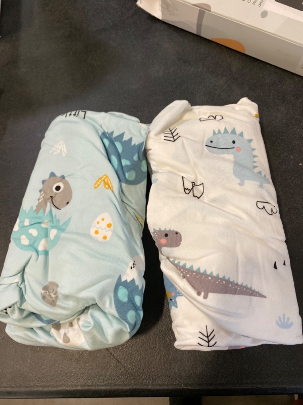 Photo 2 of GRSSDER Stretchy Ultra Soft Jersey Knit Fitted Pack n Play Sheets Set 2 Pack, Portable/Mini Cribs Sheets, Happy Dinosaurs for Girls and Boys
