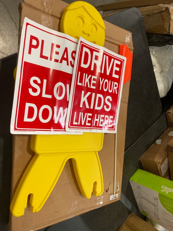 Photo 2 of Drive Like Your Kids Live Here Safety Kid Sign - Bright Yellow Highly Visible Double Sided, Durable Plastic, Slow Down Sign for Neighborhood Street, Caution Children at Play Warning