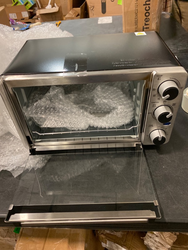 Photo 2 of Toaster Oven 4 Slice, Multi-function Stainless Steel Finish with Timer - Toast - Bake - Broil Settings, Natural Convection - 1100 Watts of Power, Includes Baking Pan and Rack by Mueller Austria
