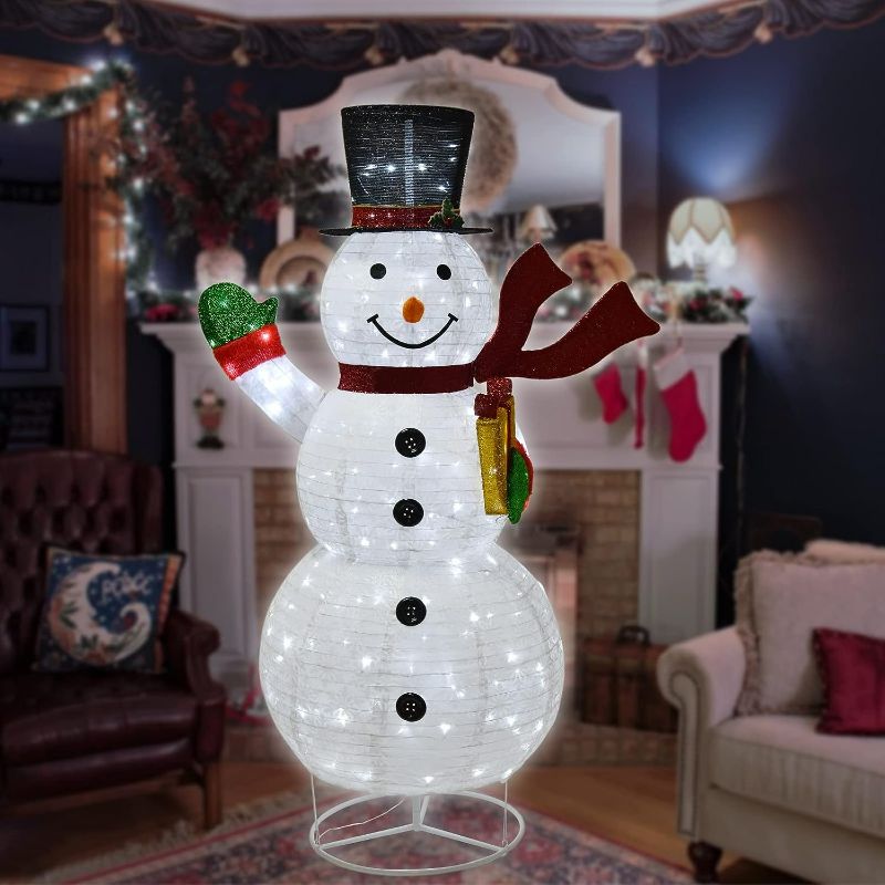 Photo 1 of Bstge Lighted Snowman Christmas Decorations, 6 FT Pop Up Christmas Decor with 200 LED Lights, Collapsible Holiday Ornaments for Indoor, Outdoor, Home, Lawn, Yard&Garden
