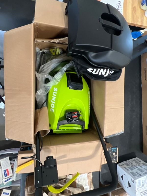 Photo 1 of Sun Joe MJ401C 14-Inch 28-Volt Cordless Push Lawn Mower, w/10.6-Gallon Collection Bag,14 inches, Green & Greenworks 24V 12" Cordless String Trimmer / Edger, 2.0Ah Battery and Charger