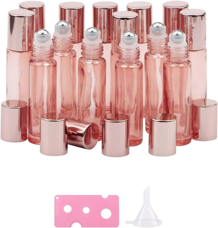 Photo 1 of Kesell Bright Rose Gold Essential Oil Roller Bottles Set with Stainless Steel Balls, 14 Pack 10ml Leakproof Glass Bottle with 14 Rollerballs for Perfume Aromatherapy Oils 1 Funnels + 1 Opener
