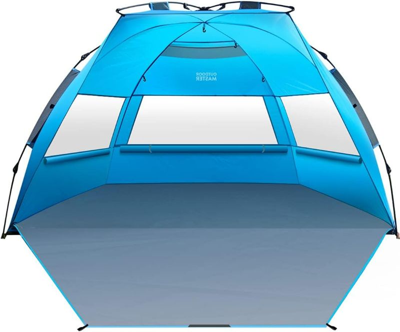 Photo 1 of OutdoorMaster Pop Up Beach Tent for 4 Person - Easy Setup and Portable Beach Shade Sun Shelter Canopy with UPF 50+ UV Protection Removable Skylight Family Size - Blue
