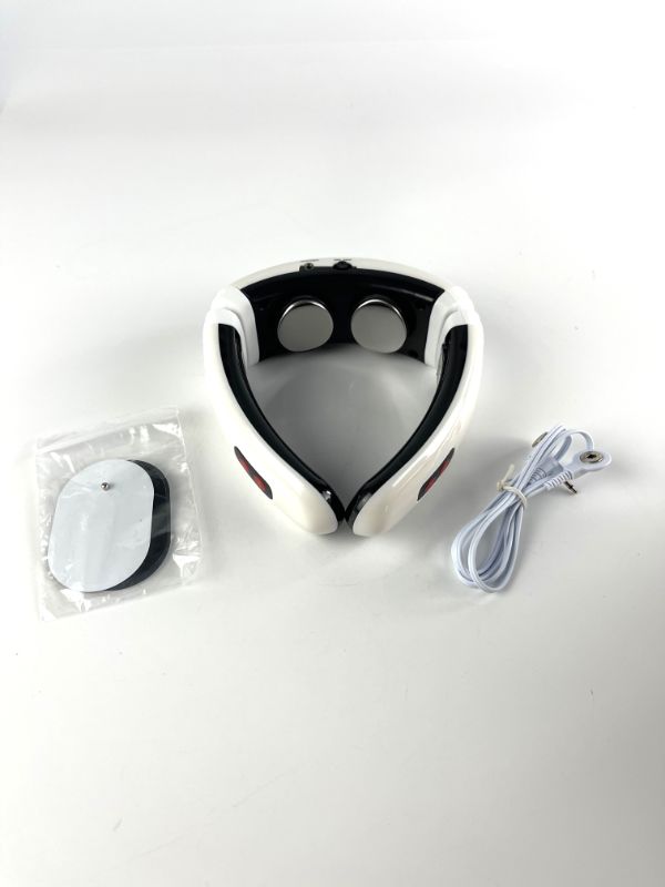 Photo 1 of NECK RELAX RELEASEES TENSION THROUGH NECK BACK AND SHOULDERS 2 ELECTRO PADS 1 ELECTRO CORD 1 NECK RELAX NEW 