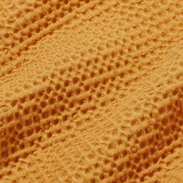 Photo 2 of Waffle textured gold colored Reversible Throw blanket - Pillowfort 60in x 50in