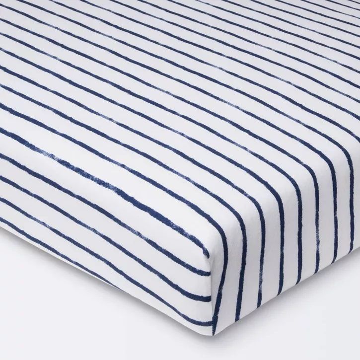 Photo 1 of Polyester Rayon Jersey Fitted Crib Sheet - Cloud Island™ Navy Blue Vertical Stripe