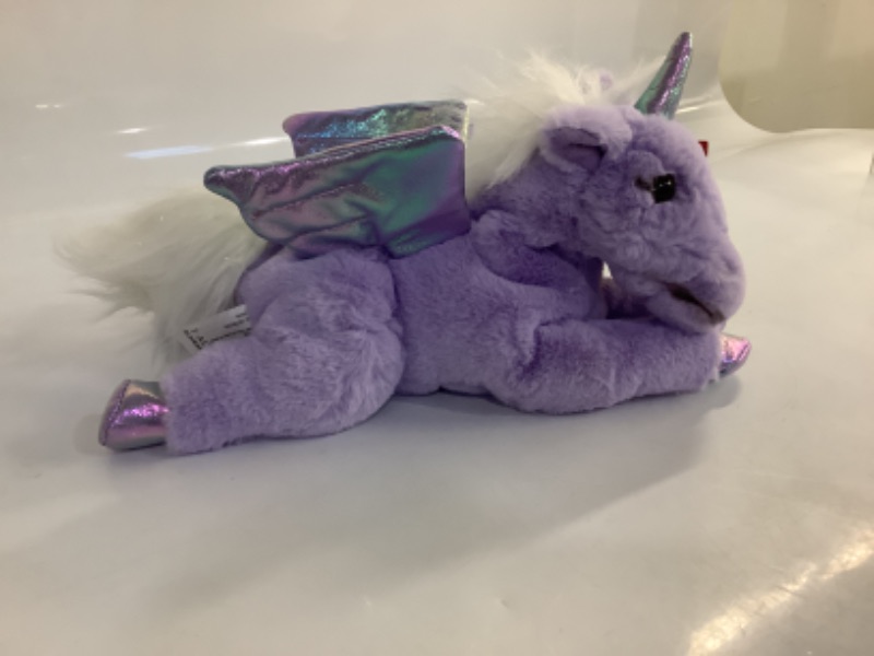 Photo 1 of FAO Schwarz adopt a pet purple unicorn- white 13in long with official apodtion papers