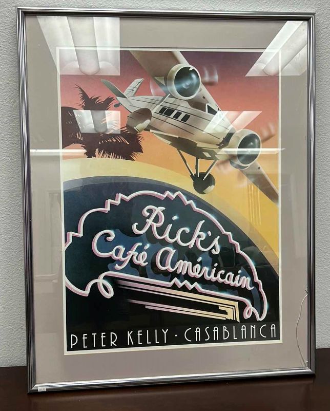 Photo 1 of RICKS CAFE AMERICAIN CASABLANCA, PETER KELLY SILVER FRAMED ARTWORK 30" x 37.5" (GLASS NEEDS REPLACING)