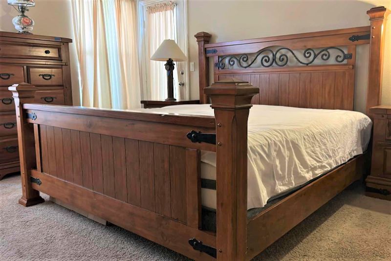 Photo 1 of HOME FURNITURE - WOOD WITH METAL ACCENTS - KING BEDFRAME HEADBOARD AND FOOTBOARD 82. 5” x 90” x H61” (MATTRESS AND OTHER PIECES SOLD SEPERATELY)
