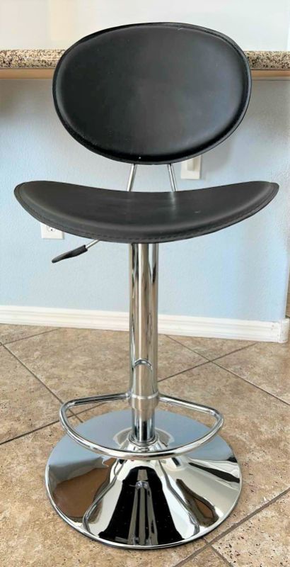 Photo 1 of CHROME AND FAUX LEATHER SWIVEL ADJUSTABLE BARSTOOL