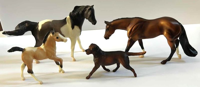 Photo 1 of 4 COLLECTIBLE FIGURES, 3 RESIN HORSES AND A DOG (TALLES HORSE IS 6")