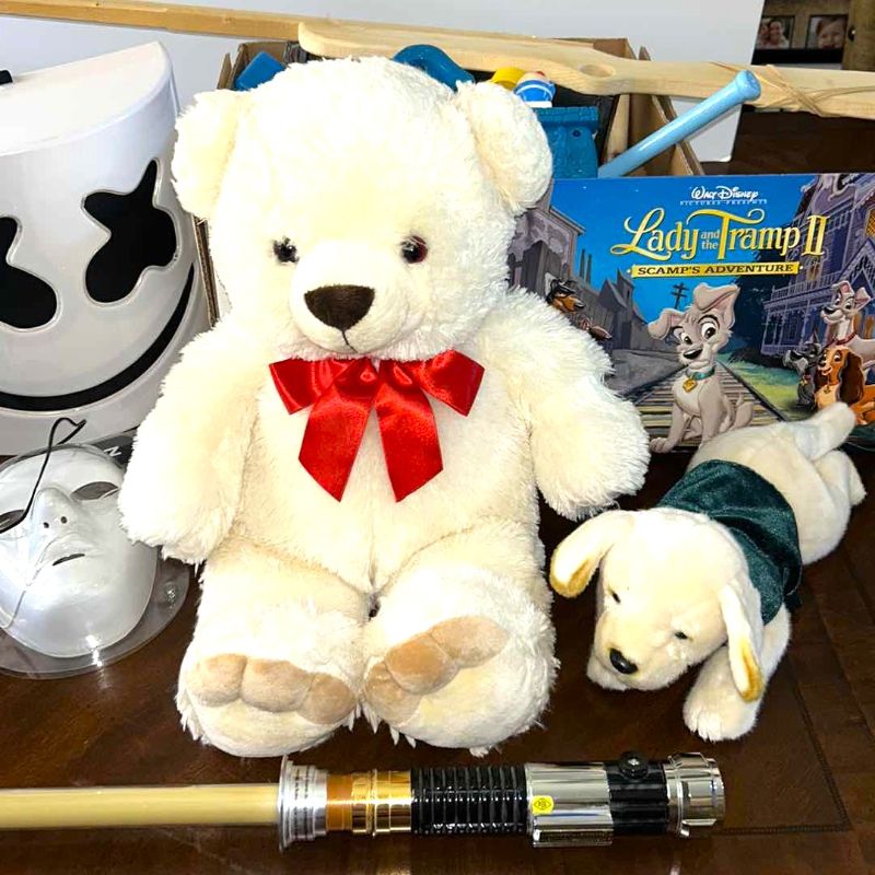 Photo 1 of CHILDREN'S TOY ASSORTMENT (light saber, rubber band rifle, stuffed animals and more)