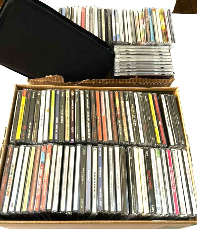 Photo 1 of 2 - BOXES OF CD'S AND CD CASE)