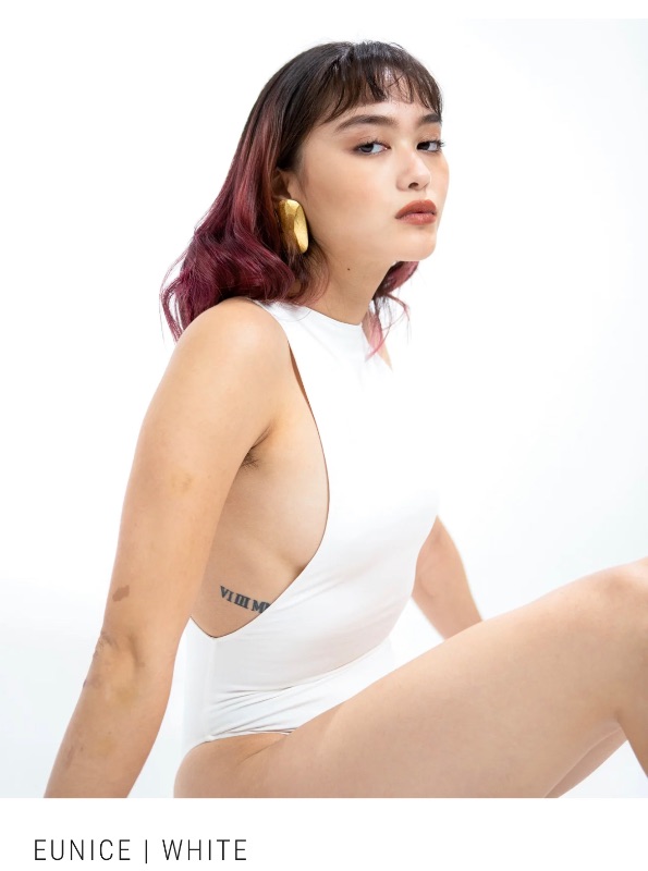 Photo 1 of SIZE M EUNICE (WHITE) THE EUNICE BODY SUIT FEATURES A BOAT NECKLINE WITH A HIGH CUT TO ELONGATE YOUR LEGS AND A LOW CUT ON THE SIDES THAT GIVE YOU AN EDGY YET CLASSY TOUCH. IT’S GUARANTEED TO RISE AND HUG YOU IN ALL THE RIGHT PLACES