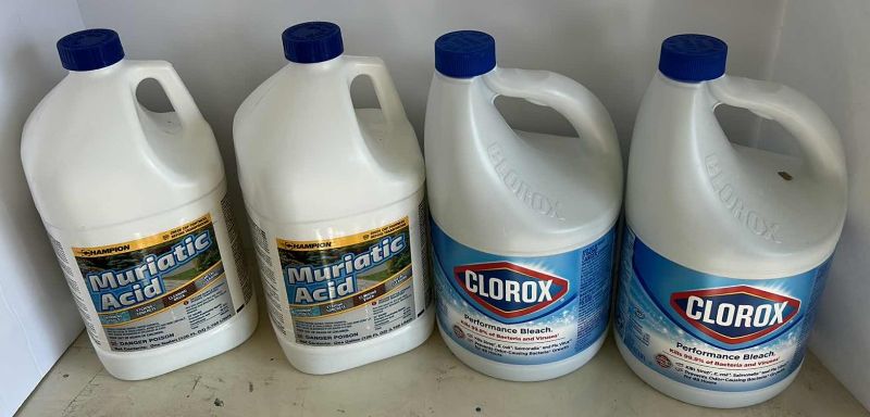 Photo 1 of TWO NEW CONTAINERS OF MURIATIC ACID AND TWO NEW CONTAINERS OF CLORAX BLEACH 