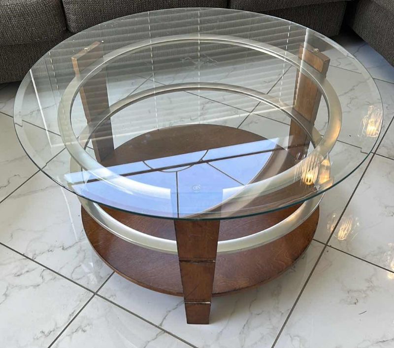 Photo 1 of WOOD CHROME AND GLASS ROUND COCKTAIL TABLE  36” x 20”