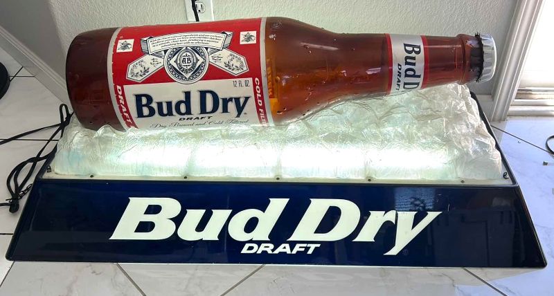 Photo 1 of BUD DRY DRAFT BEER LIGHTED NEON SIGN  44” x 20” x 17”