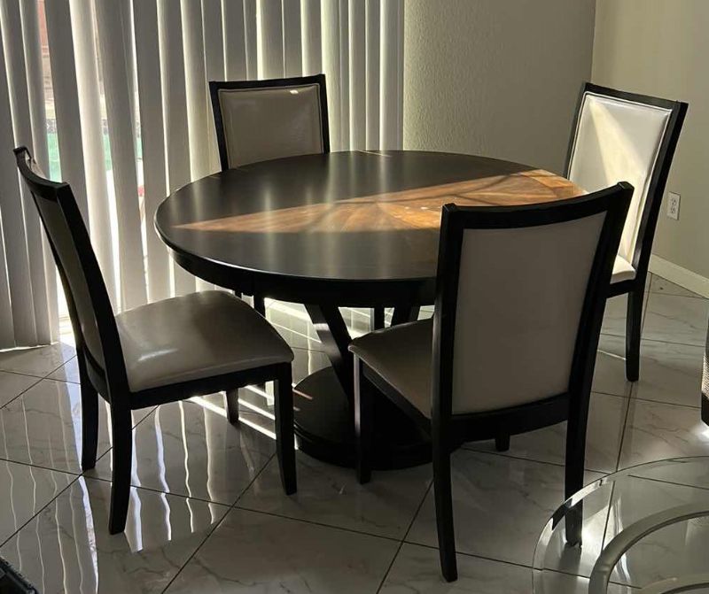 Photo 1 of ROUND WOOD TABLE WITH 4 CHAIRS 53” x 30”