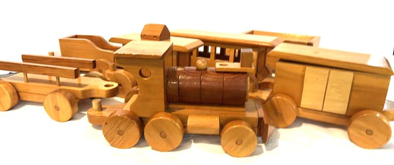 Photo 1 of BOX OF VINTAGE WOOD TOY TRAIN SET ENGINE MEASURES 14” x 7”