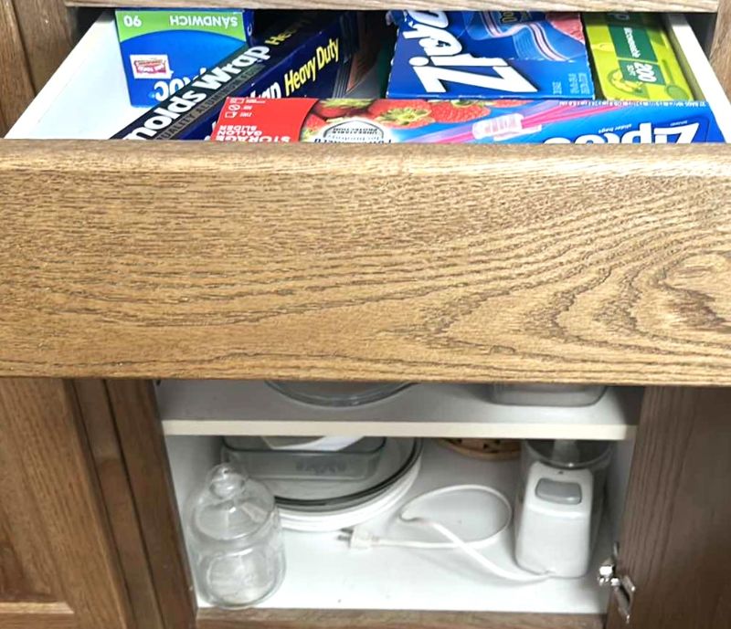 Photo 1 of CONTENTS OF KITCHEN CABINET AND DRAWER