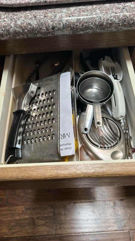 Photo 2 of CONTENTS OF 4 DRAWERS IN KITCHEN