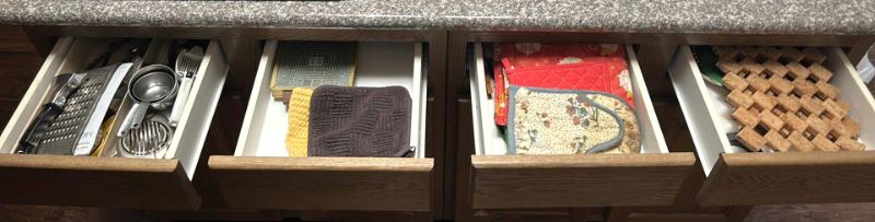 Photo 1 of CONTENTS OF 4 DRAWERS IN KITCHEN