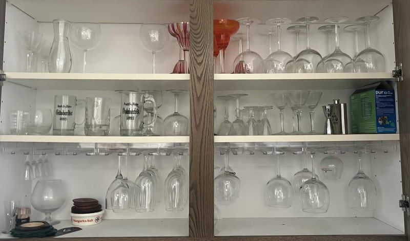 Photo 1 of CONTENTS OF CABINET IN BAR