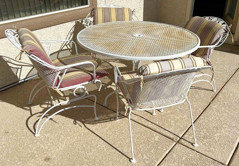 Photo 2 of METAL PATIO TABLE AND 4 CHAIRS