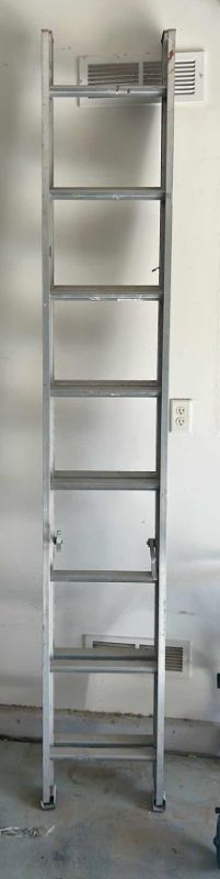 Photo 1 of ALUMINUM ADJUSTABLE SLIDING LADDER 8’ to 26’