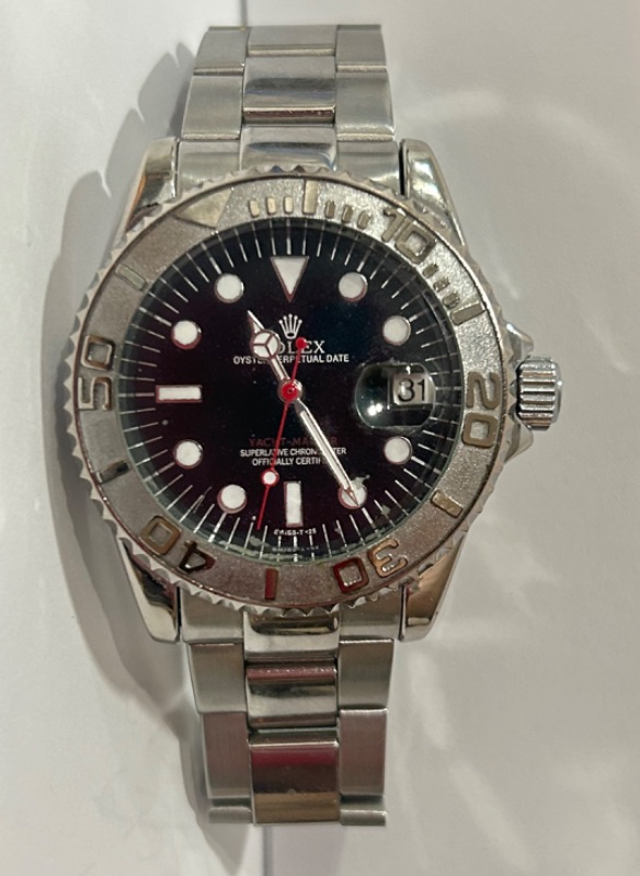 Photo 1 of FAUX VINTAGE ROLEX YACHT-MASTER WATCH  AD DAYTONA 1992 WINNER 24 (NOT AUTHENTIC)