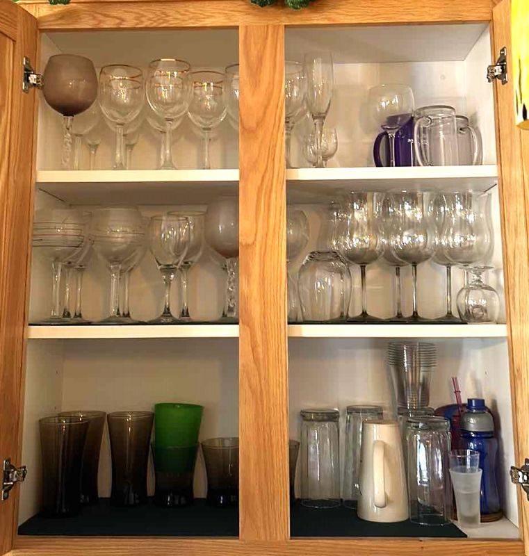 Photo 1 of CONTENTS OF KITCHEN CABINET - STEMWARE AND MORE