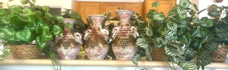 Photo 1 of HOME DECOR 6 BASKETS OF FAUX GREENERY AND 3 CLAY VASES TALLEST H12”