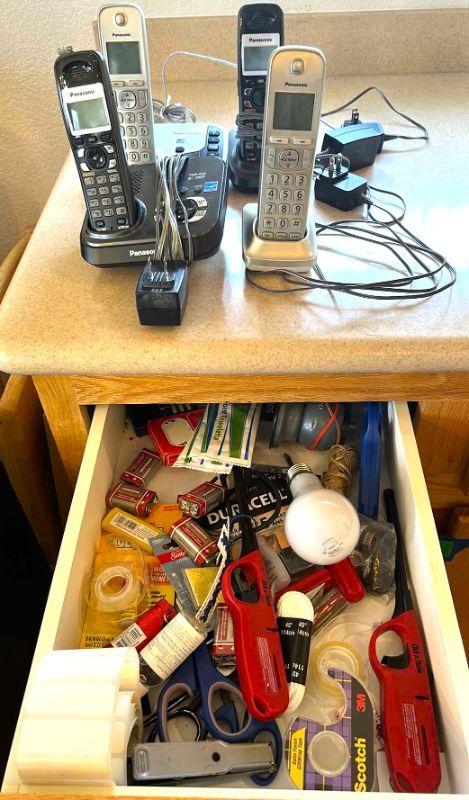 Photo 1 of 4 PHONES AND CONTENTS OF DRAWER