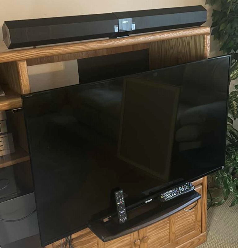 Photo 1 of SONY 49” TV WITH REMOTE AND SOUND BAR