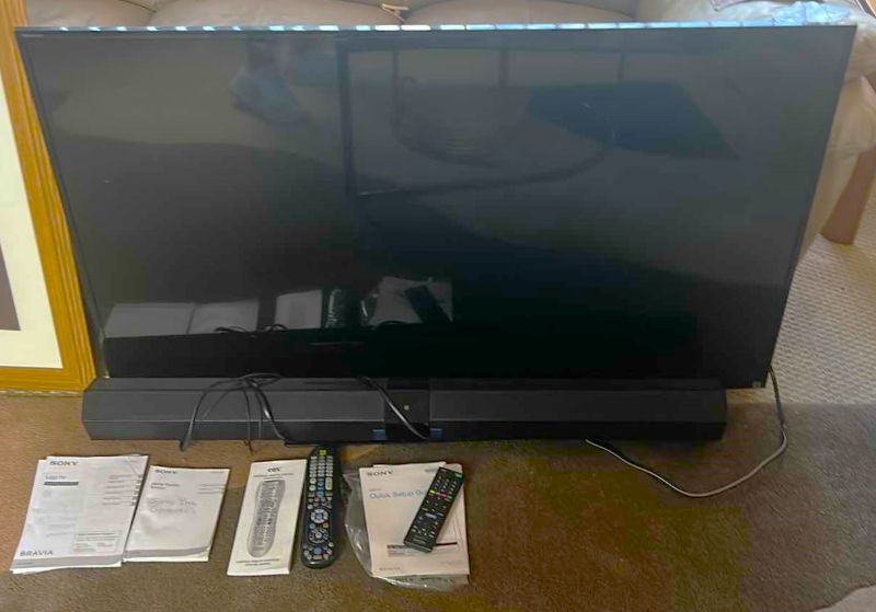 Photo 2 of SONY 49” TV WITH REMOTE AND SOUND BAR