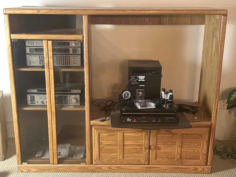 Photo 1 of OAK ENTERTAINMENT CENTER (CONTENTS SOLD SEPARATELY) 63” x 21” x 52”