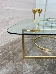 Photo 2 of VINTAGE HOLLYWOOD REGENCY TEARDROP GLASS AND BRASS COFFEE TABLE
