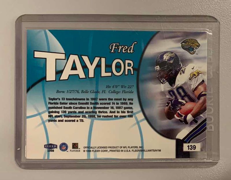 Photo 1 of 1998 FLEER BRILLIANTS FRED TAYLOR ROOKIE 139 FOOTBALL CARD