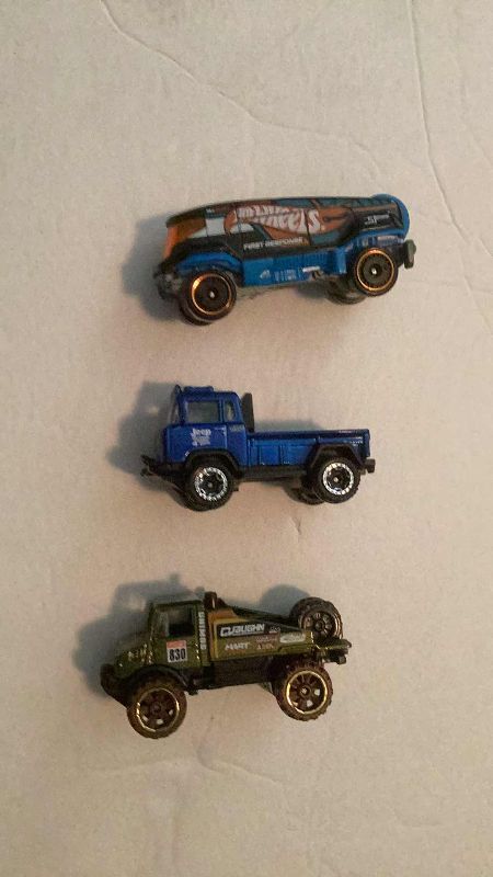 Photo 1 of 3-EXOTIC HOT WHEELS AND 3-NHL HOCKEY ZAMBONI’S RED WINGS