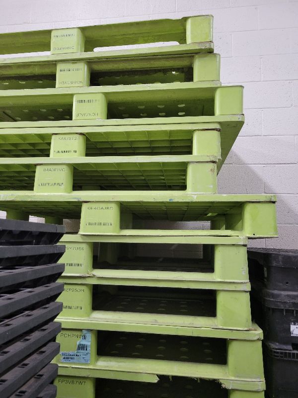 Photo 1 of ONE STACKABLE PLASTIC PALLET 40” TO 48” SQUARE. DIFFERENT TYPES AVAILABLE.
