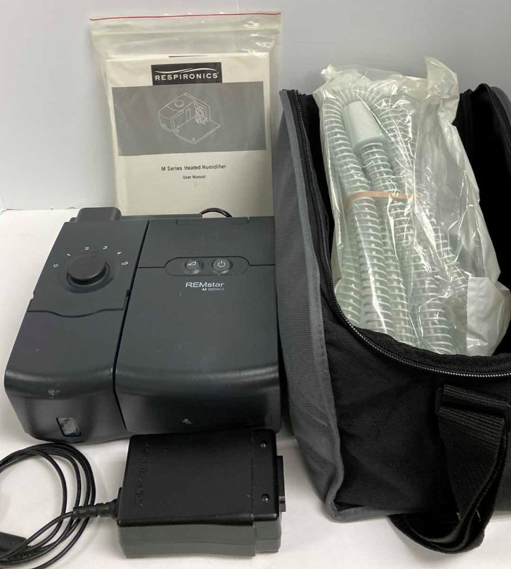 Photo 1 of RESPIRONICS C-PAP WITH MANUAL AND BAG