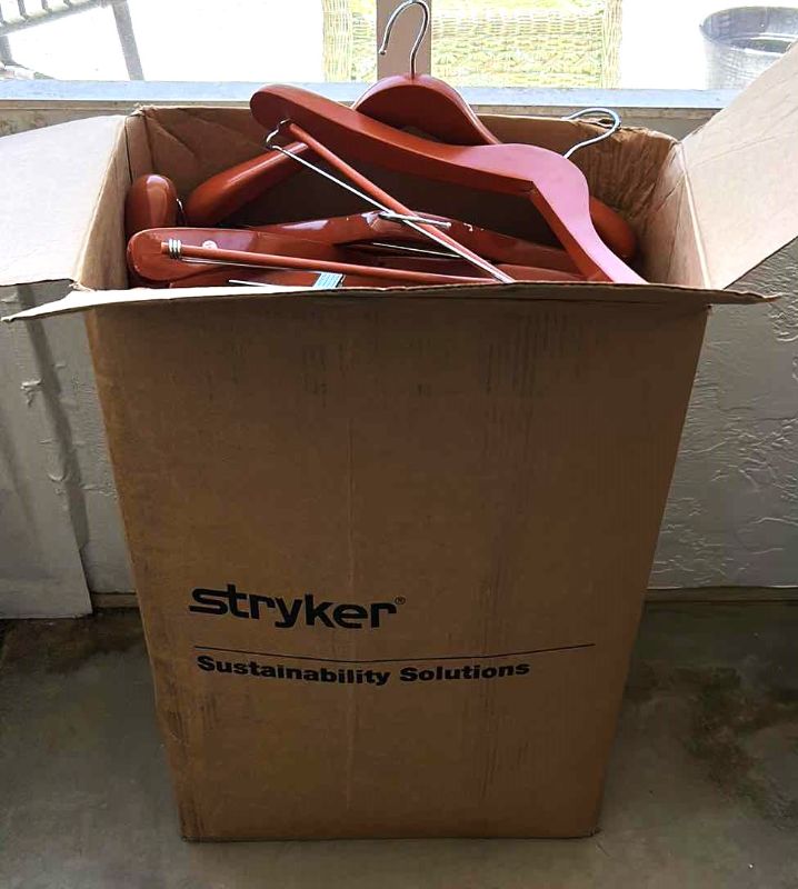 Photo 1 of LARGE BOX FULL OF WOOD HANGERS