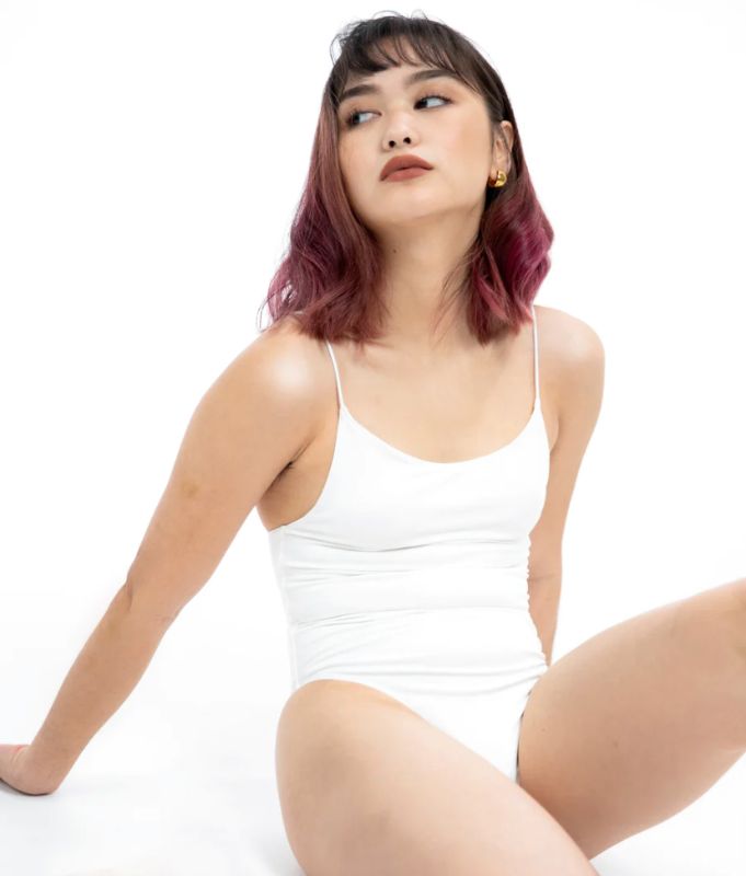 Photo 1 of SIZE X-SMALL AMIRA WHITE BODYSUIT FEATURES ROUND NECKLINE STRAPS AND HI-CUT LEGS. ULTRA SOFTCOTTON LINING FOR PEAK COMFORT.