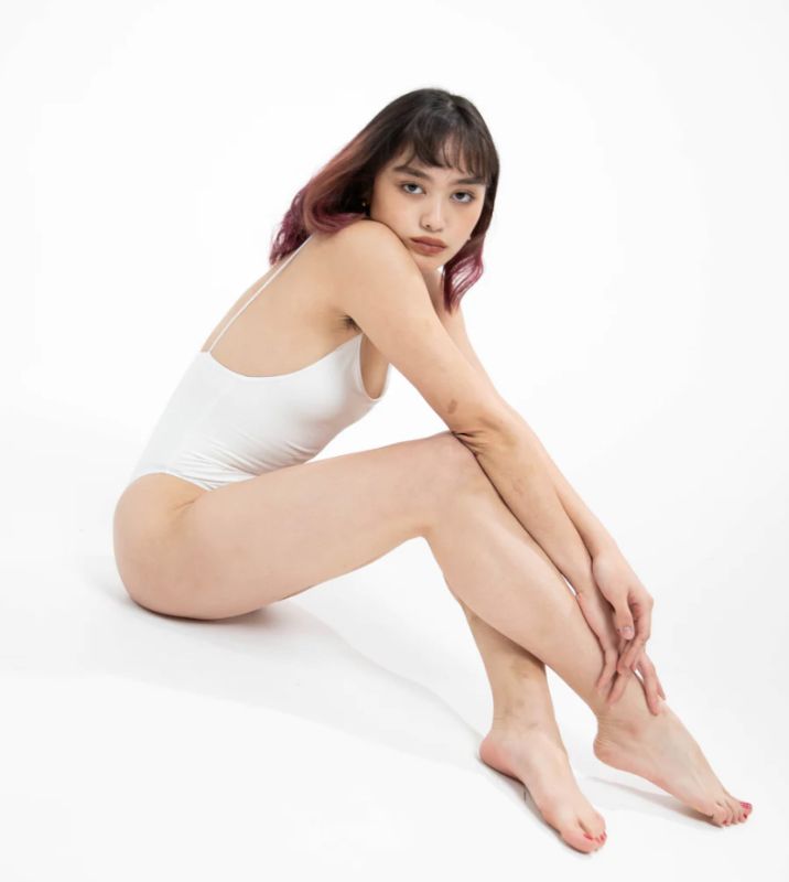 Photo 4 of SIZE X-SMALL AMIRA WHITE BODYSUIT FEATURES ROUND NECKLINE STRAPS AND HI-CUT LEGS. ULTRA SOFTCOTTON LINING FOR PEAK COMFORT.